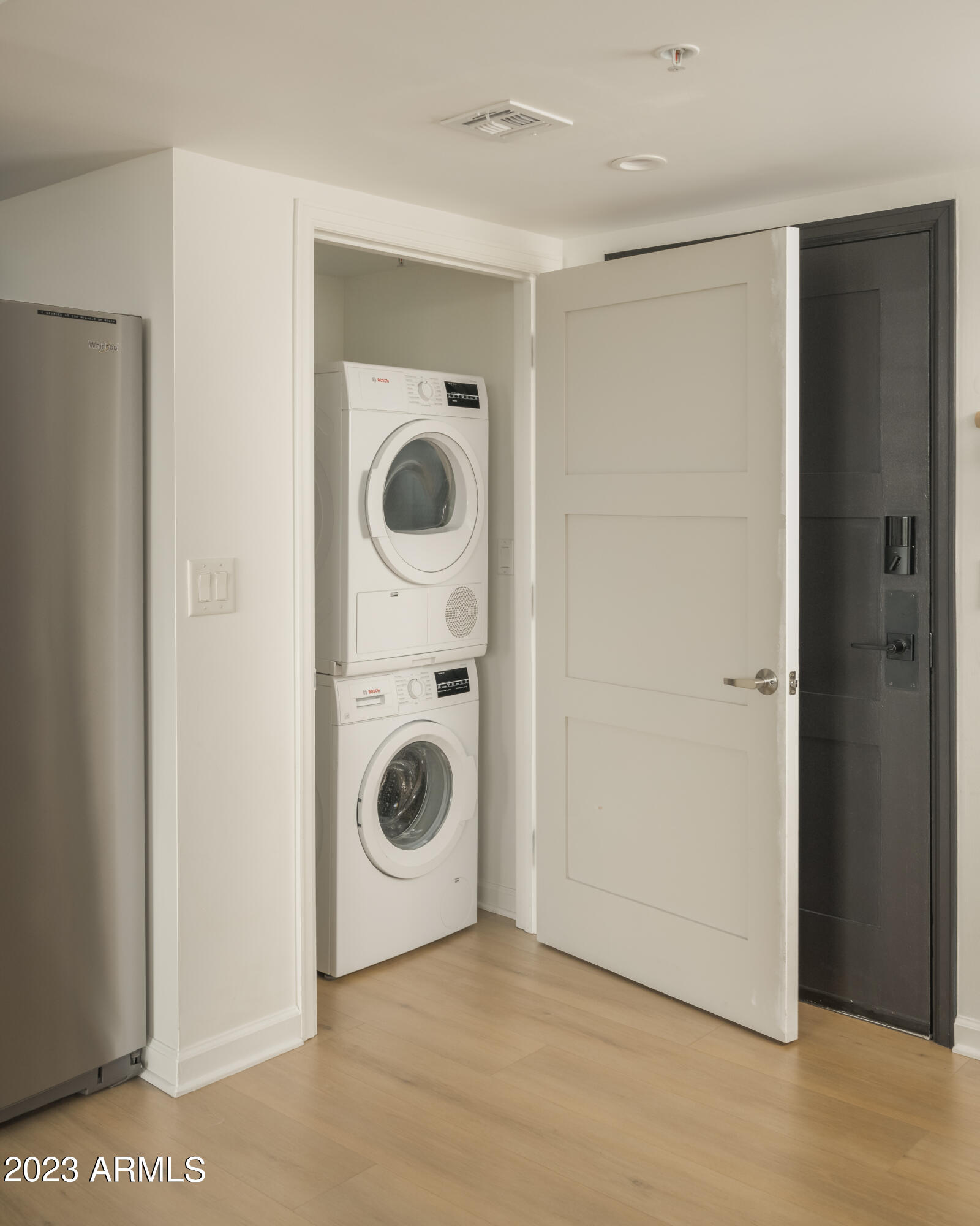 535 West Thomas Road, Unit 508 Phoenix, AZ 85013 - Photo 14 of 20 Bosch Indoor Laundry Off Kitchen