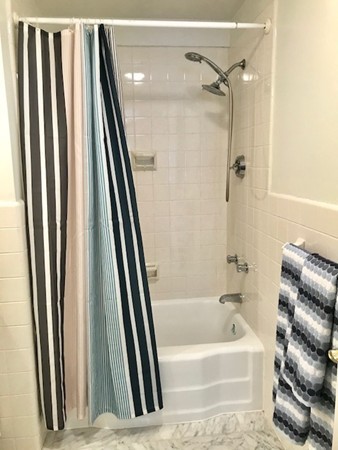 5 Porter Road, Unit 301 Andover, MA 01810 - Photo 22 of 25 a bathroom with a bathtub