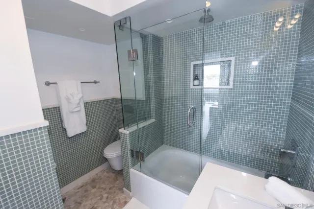 a bathroom with a sink and toilet