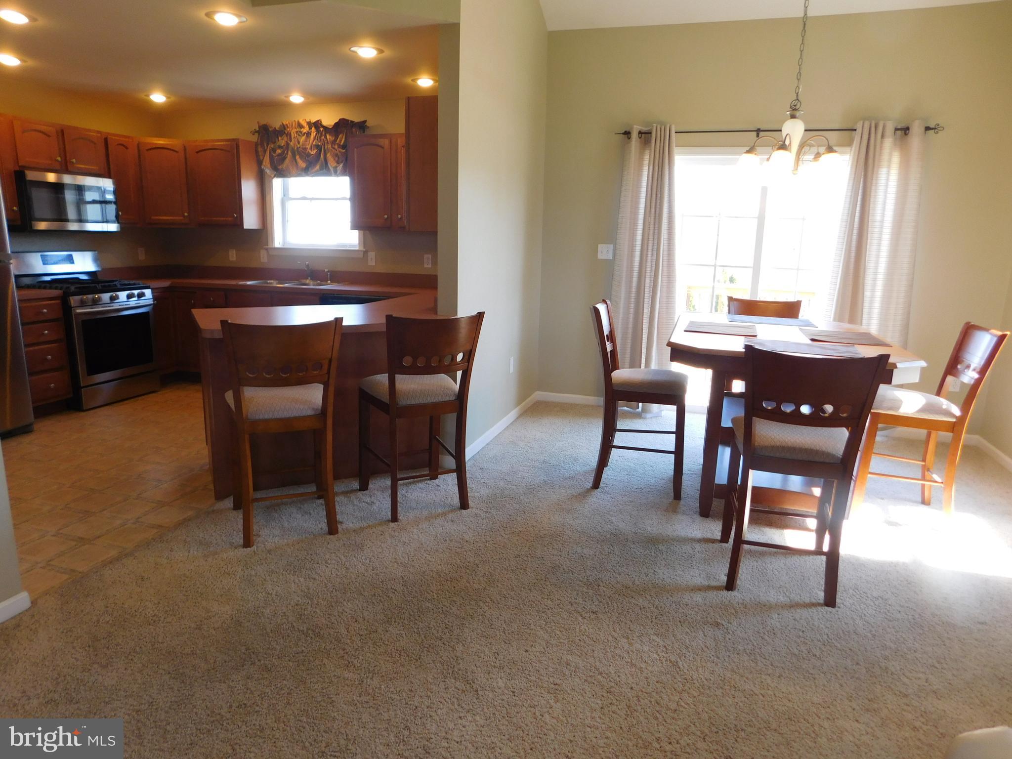 5405 Board Road Mount Wolf, PA 17347 - Photo 5 of 28 Kitchen & dining area- kitchen has breakfast bar