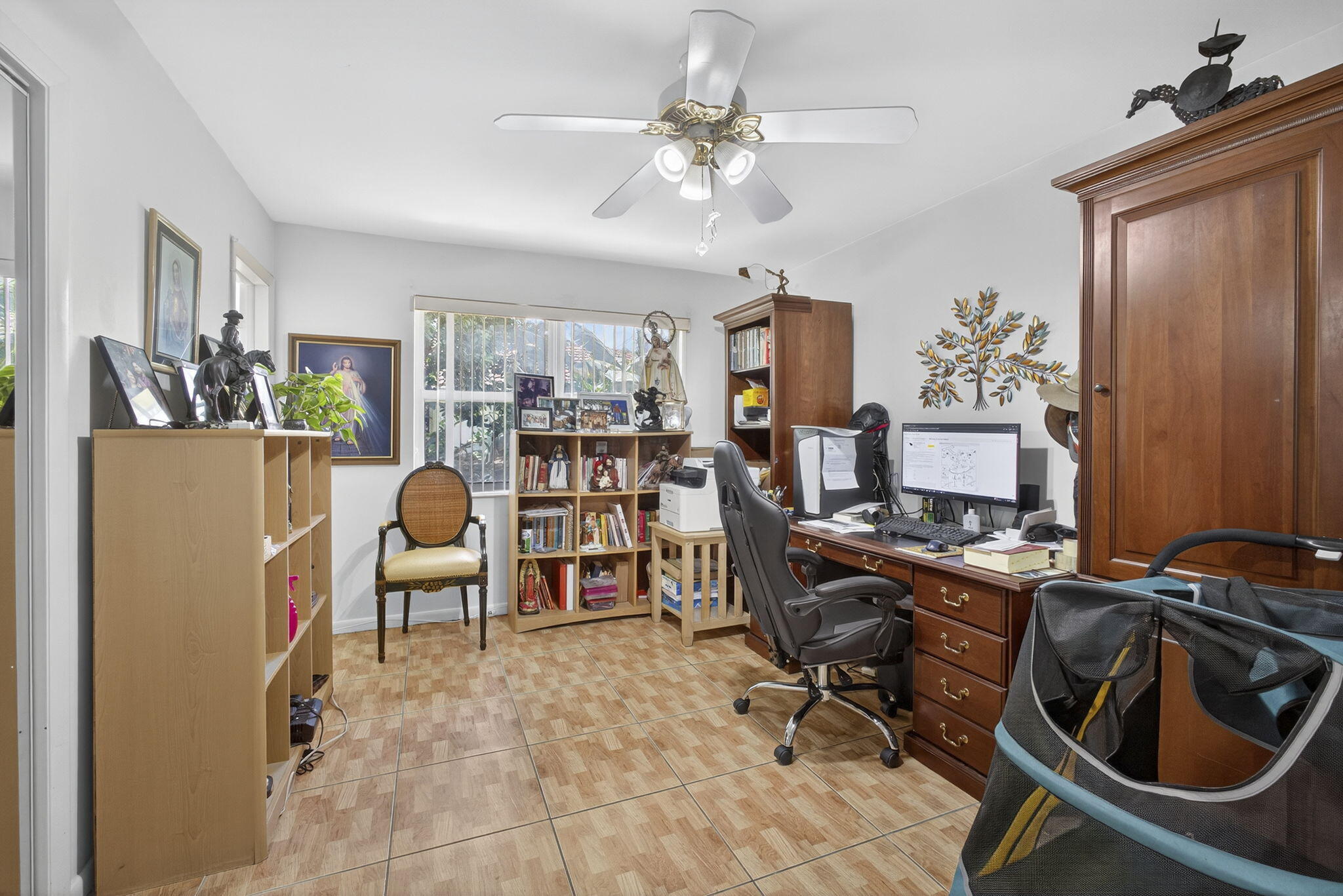 7625 Clarke Road Lake Clarke Shores, FL 33406 - Photo 16 of 97 a view of a workspace with furniture and a workspace