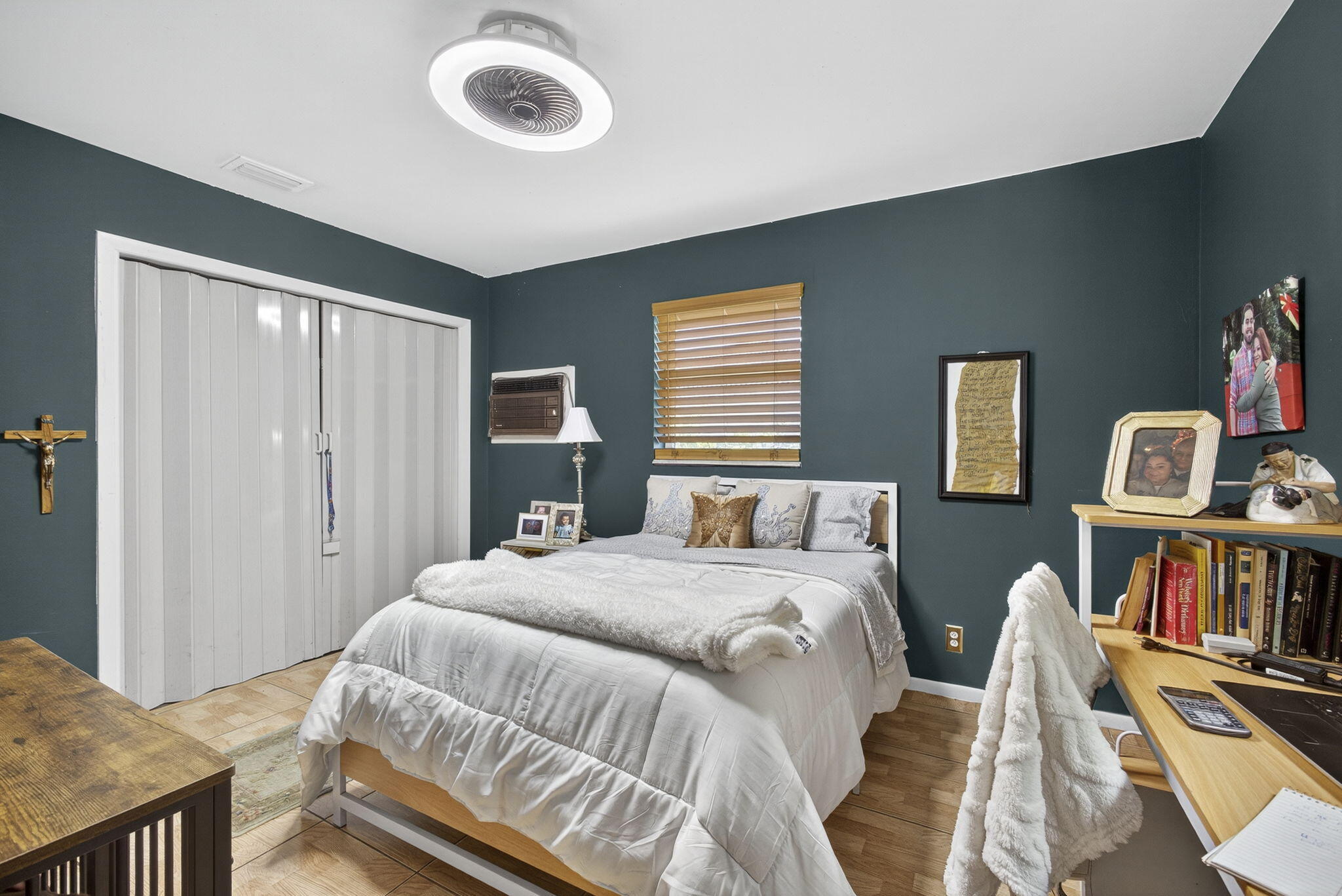 7625 Clarke Road Lake Clarke Shores, FL 33406 - Photo 24 of 97 a bedroom with a bed and dresser