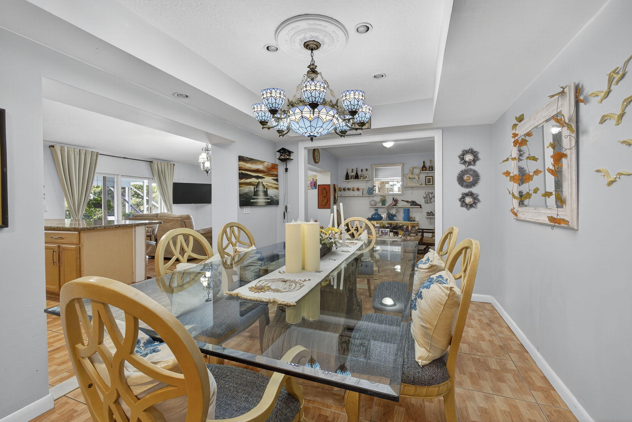 7625 Clarke Road Lake Clarke Shores, FL 33406 - Photo 34 of 97 a view of a dining room with furniture and chandelier