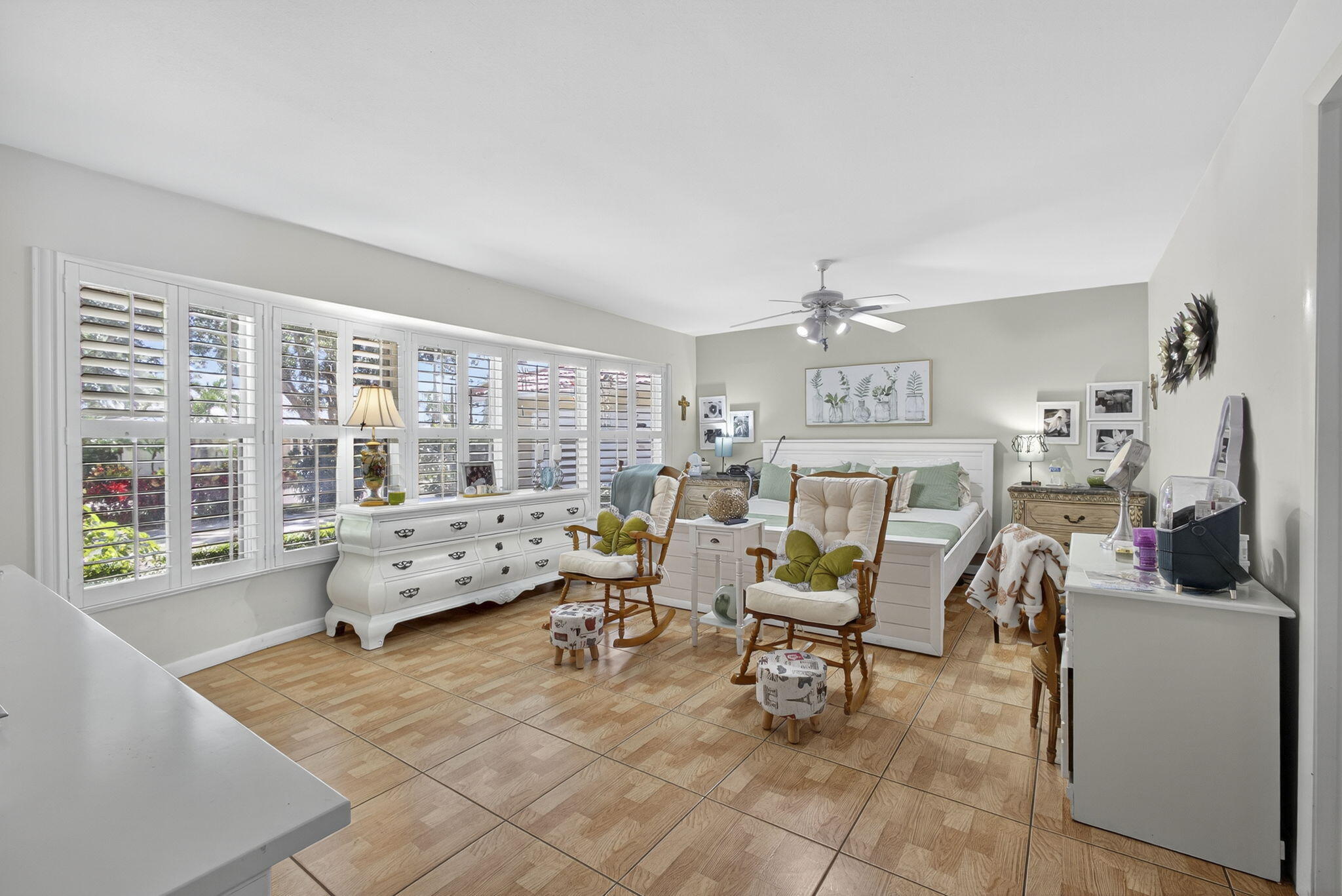 7625 Clarke Road Lake Clarke Shores, FL 33406 - Photo 45 of 97 a living room with furniture and a large window