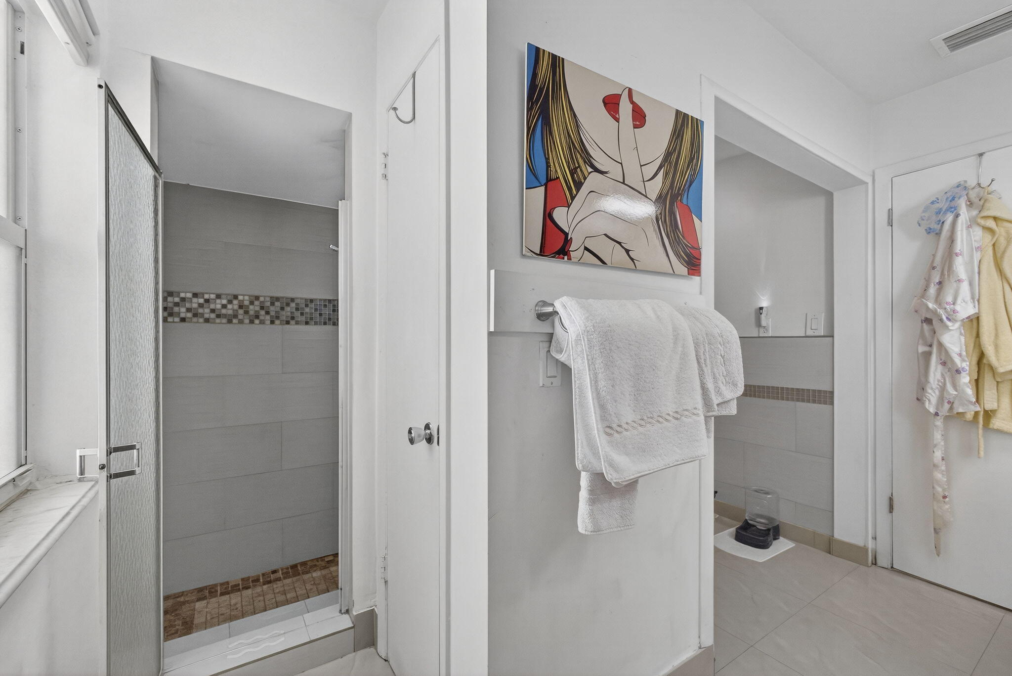 7625 Clarke Road Lake Clarke Shores, FL 33406 - Photo 54 of 97 a bathroom with a picture of a shower curtain