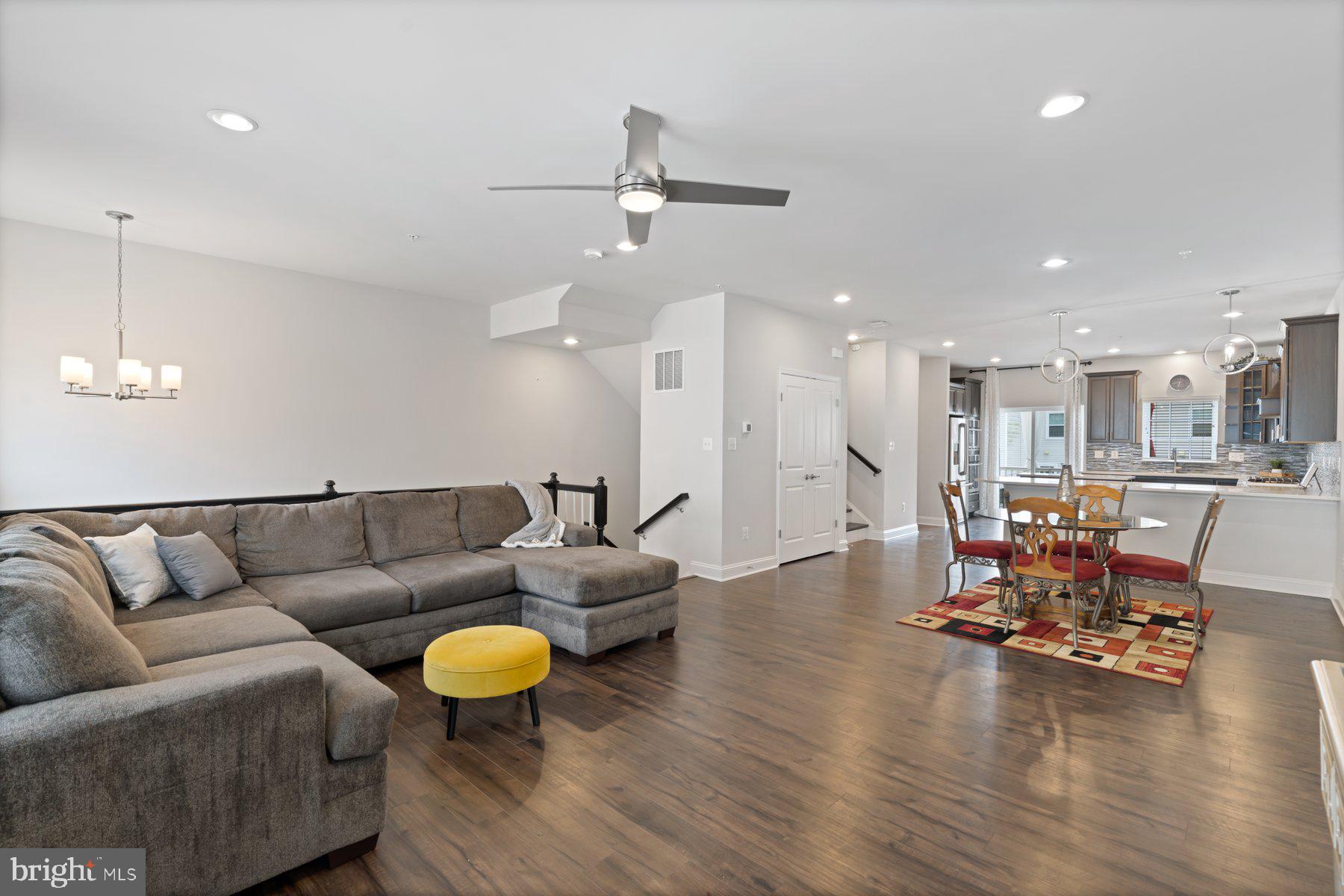 2713 Lady Slipper Road Gambrills, MD 21054 - Photo 11 of 55 a living room with furniture and kitchen view