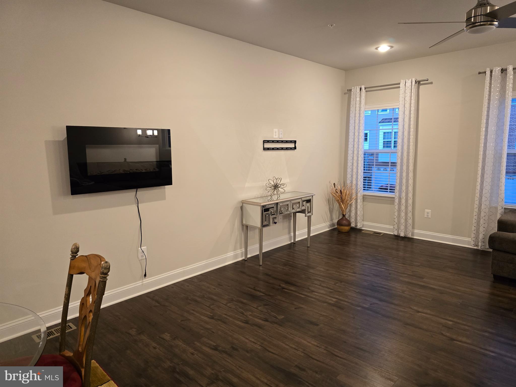 2713 Lady Slipper Road Gambrills, MD 21054 - Photo 12 of 55 a view of a livingroom with furniture and wooden floor