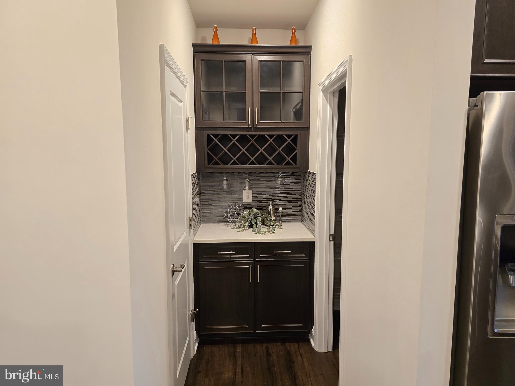 2713 Lady Slipper Road Gambrills, MD 21054 - Photo 17 of 55 a kitchen with a refrigerator and a sink