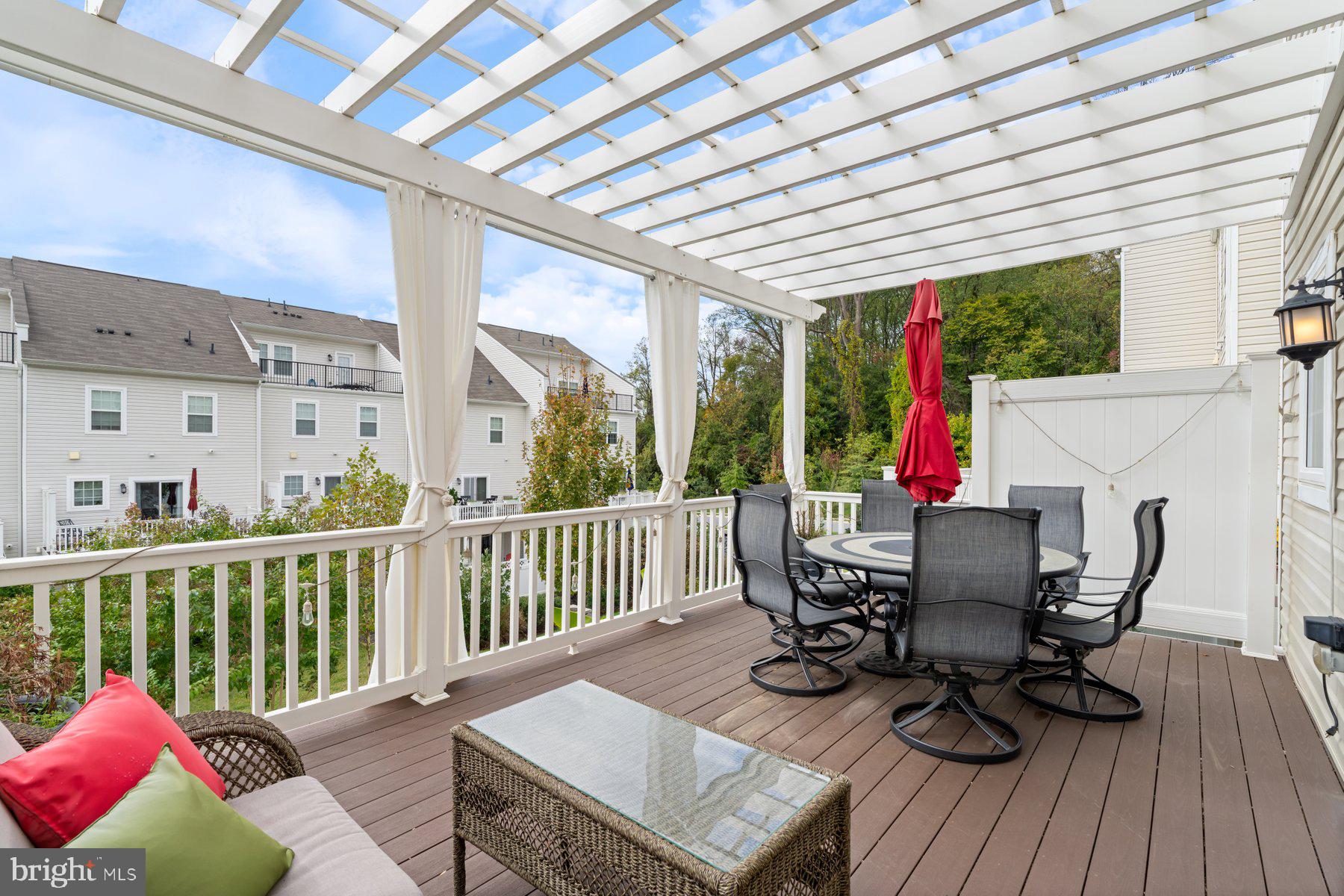 2713 Lady Slipper Road Gambrills, MD 21054 - Photo 19 of 55 a view of balcony with furniture and wooden floor