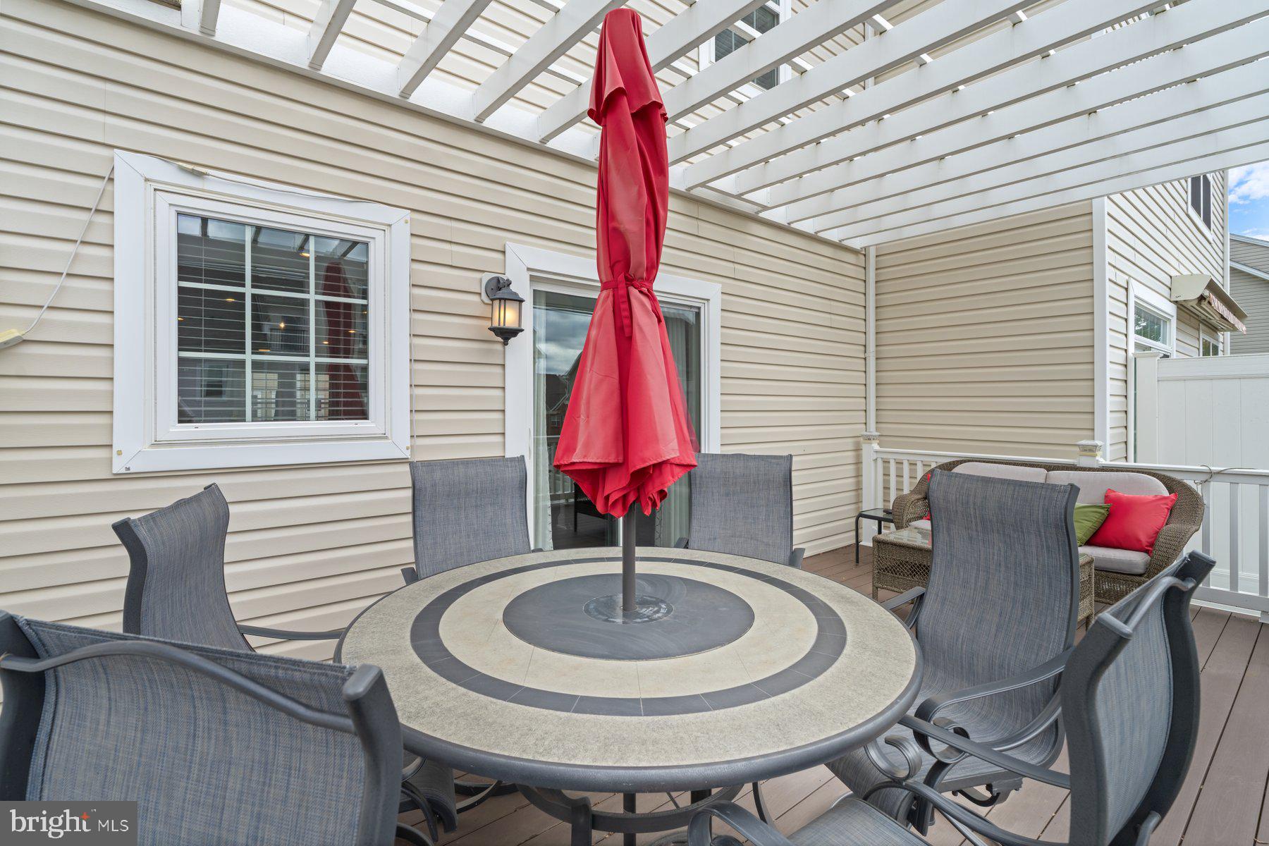 2713 Lady Slipper Road Gambrills, MD 21054 - Photo 20 of 55 a view of a dining room with furniture and wooden floor