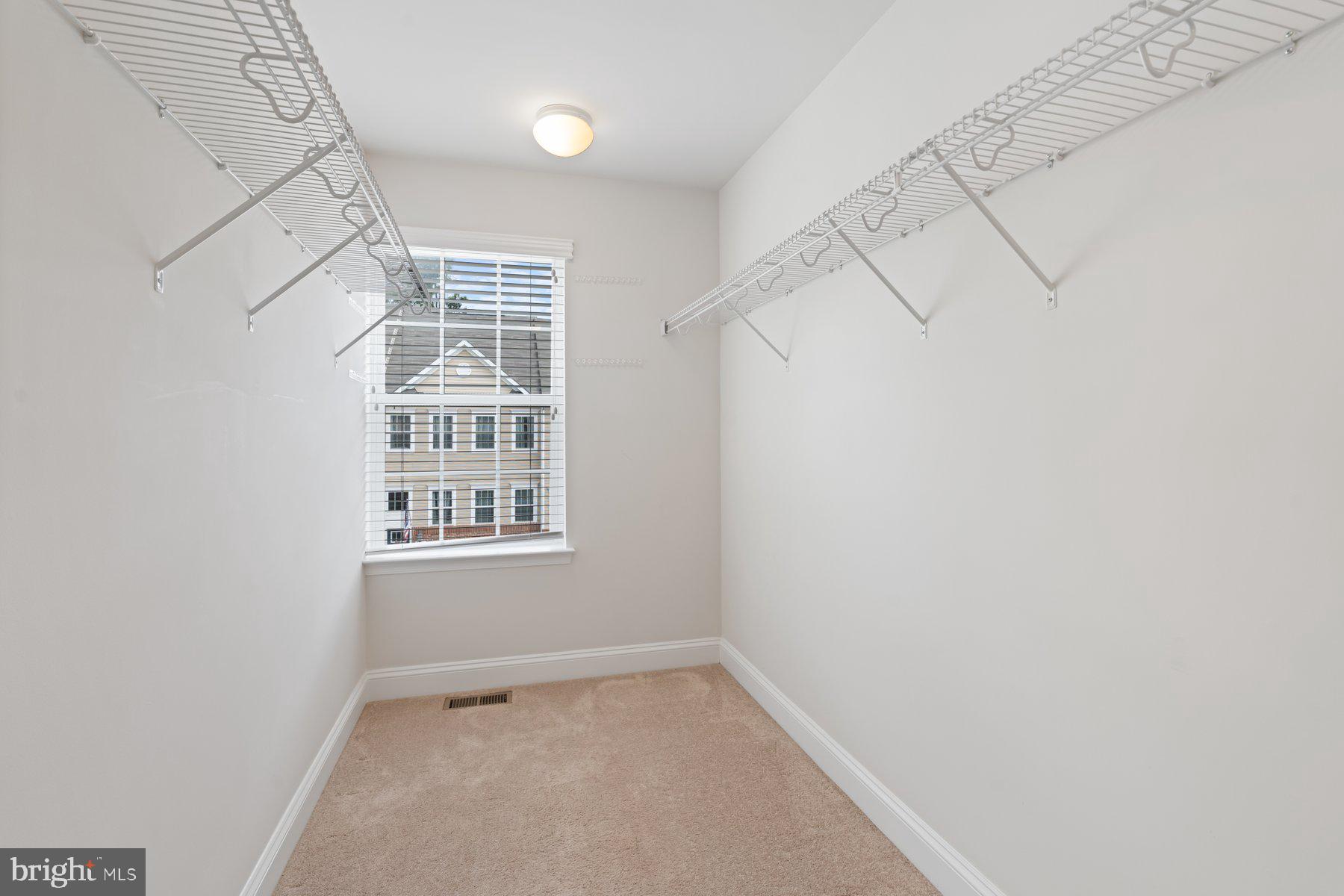 2713 Lady Slipper Road Gambrills, MD 21054 - Photo 25 of 55 a view of an empty room with a window