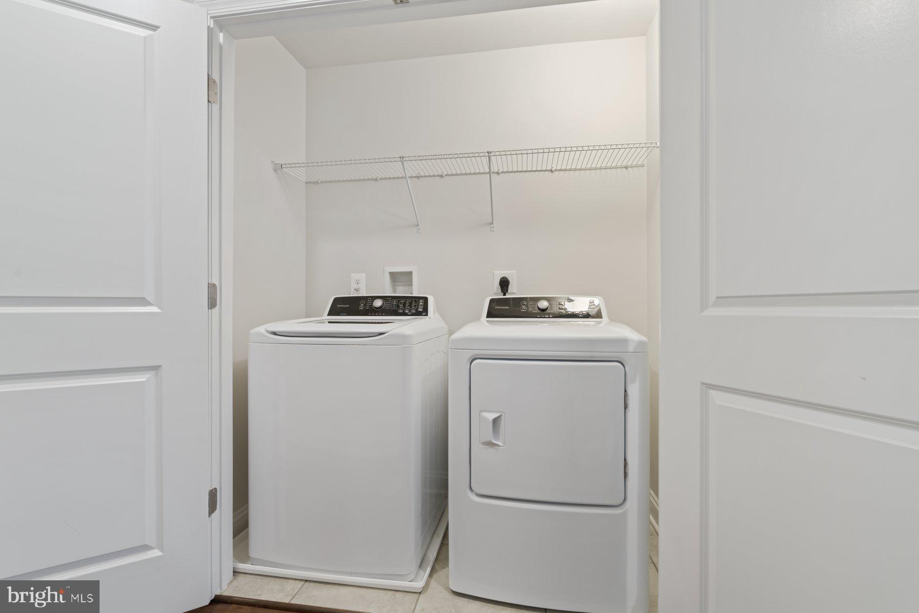 2713 Lady Slipper Road Gambrills, MD 21054 - Photo 28 of 55 a utility room with dryer and washer