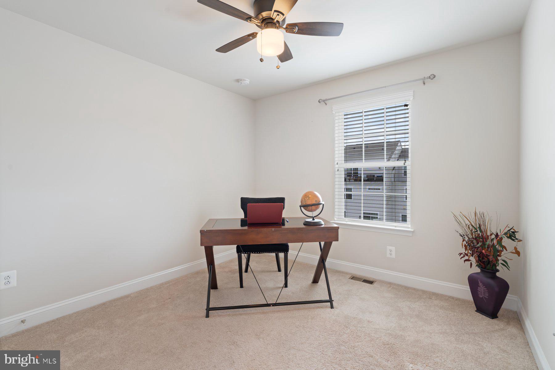 2713 Lady Slipper Road Gambrills, MD 21054 - Photo 30 of 55 a workspace with furniture and a window