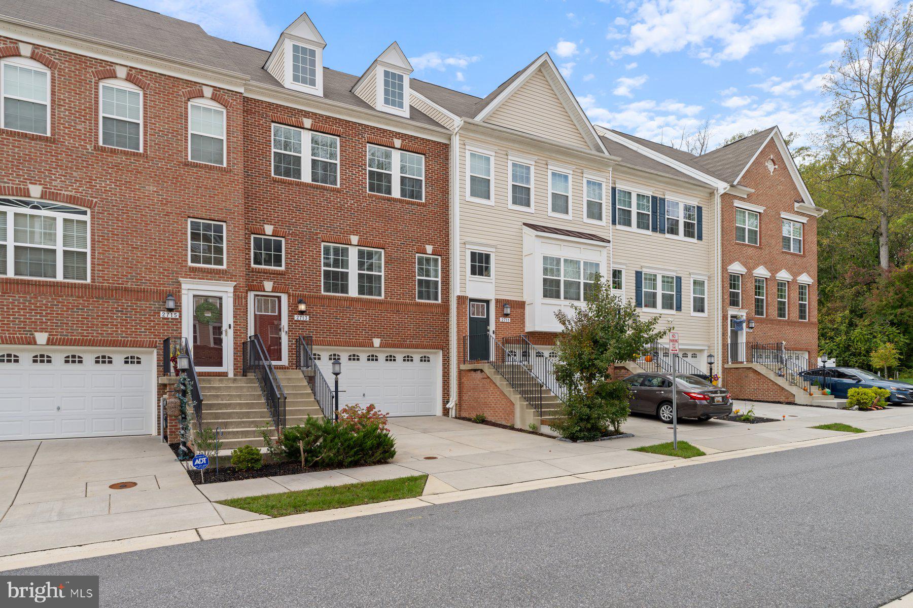 2713 Lady Slipper Road Gambrills, MD 21054 - Photo 3 of 55 a front view of a building with yard