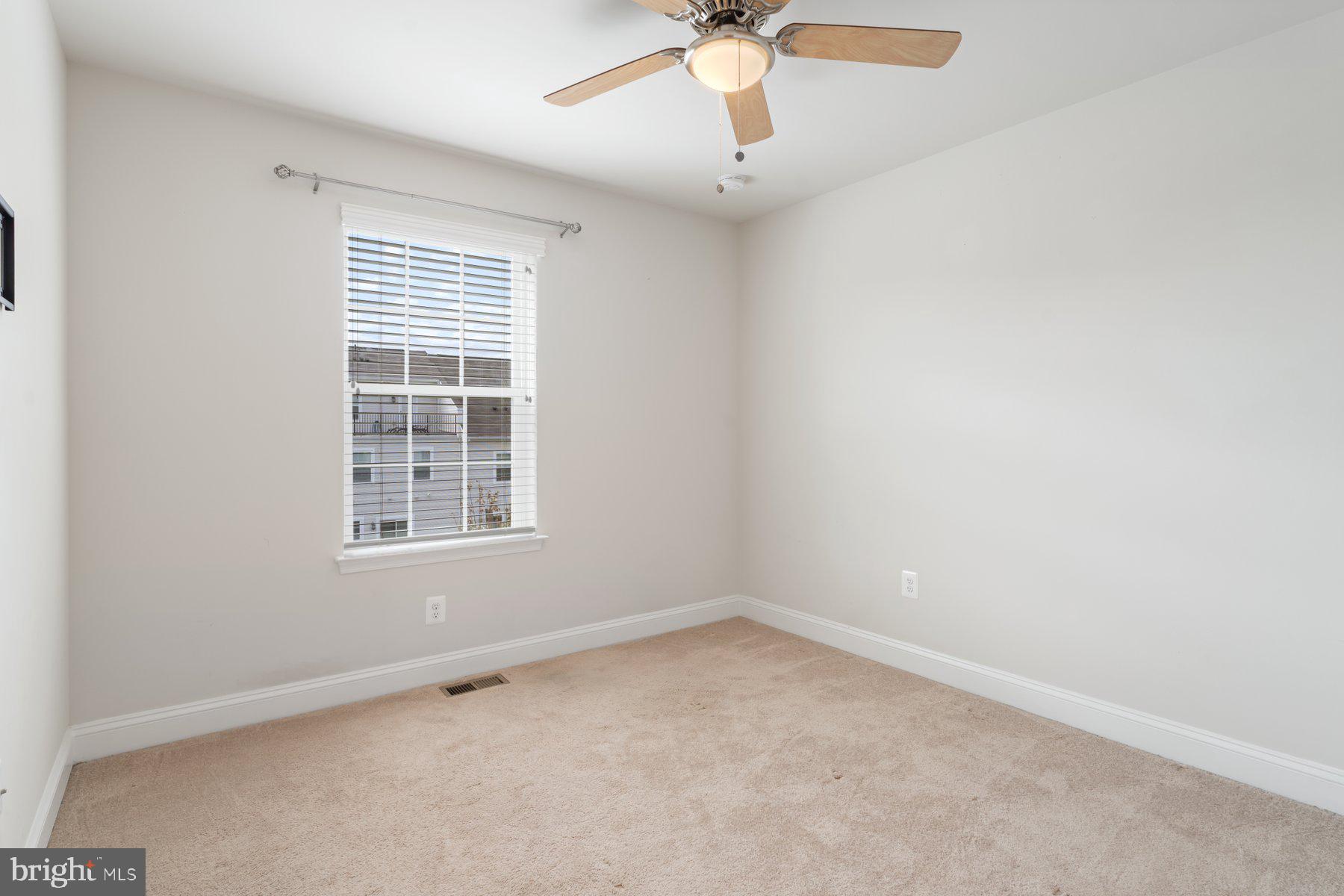 2713 Lady Slipper Road Gambrills, MD 21054 - Photo 33 of 55 an empty room with a window