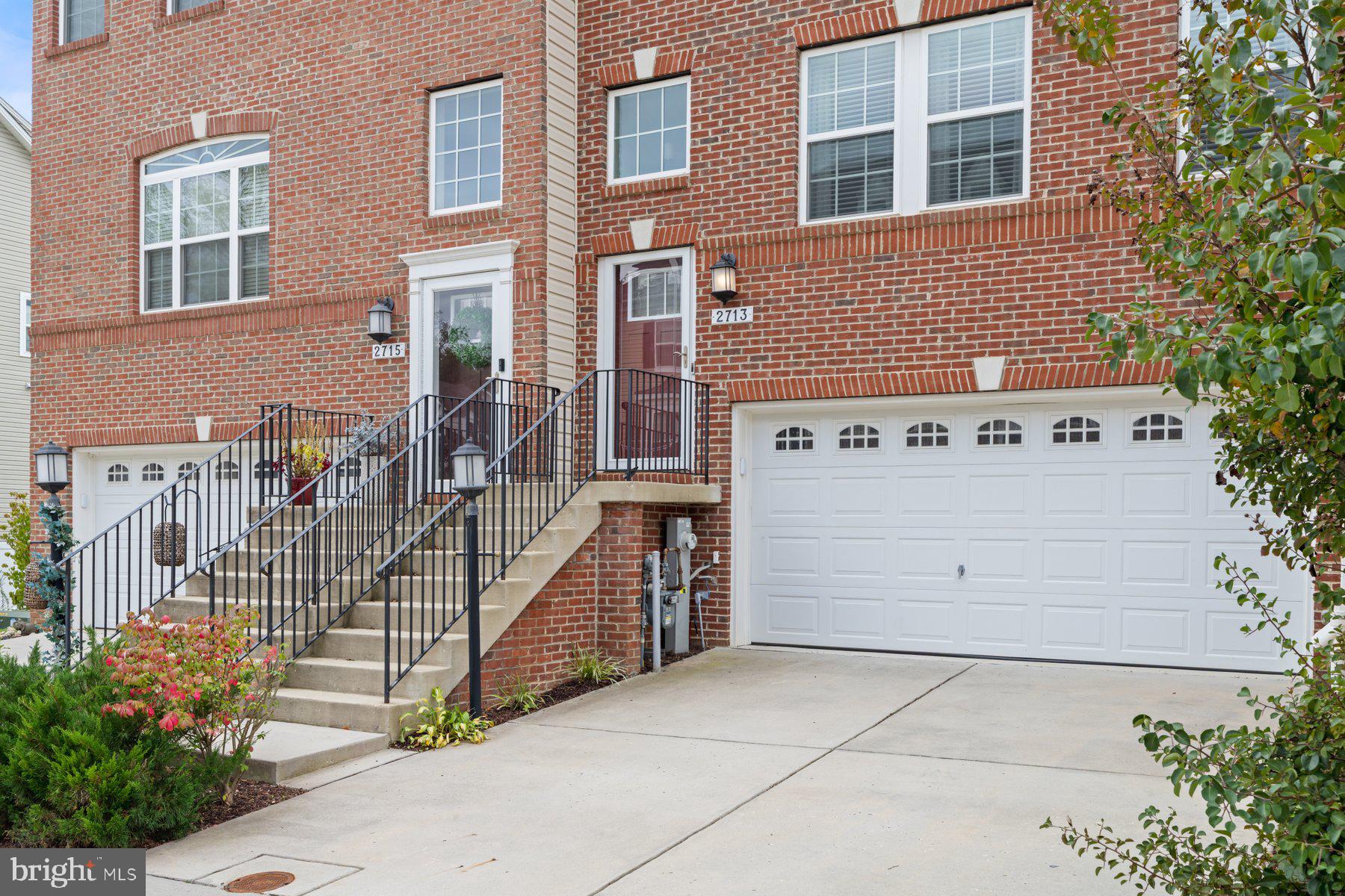 2713 Lady Slipper Road Gambrills, MD 21054 - Photo 4 of 55 a view of a house with a garage