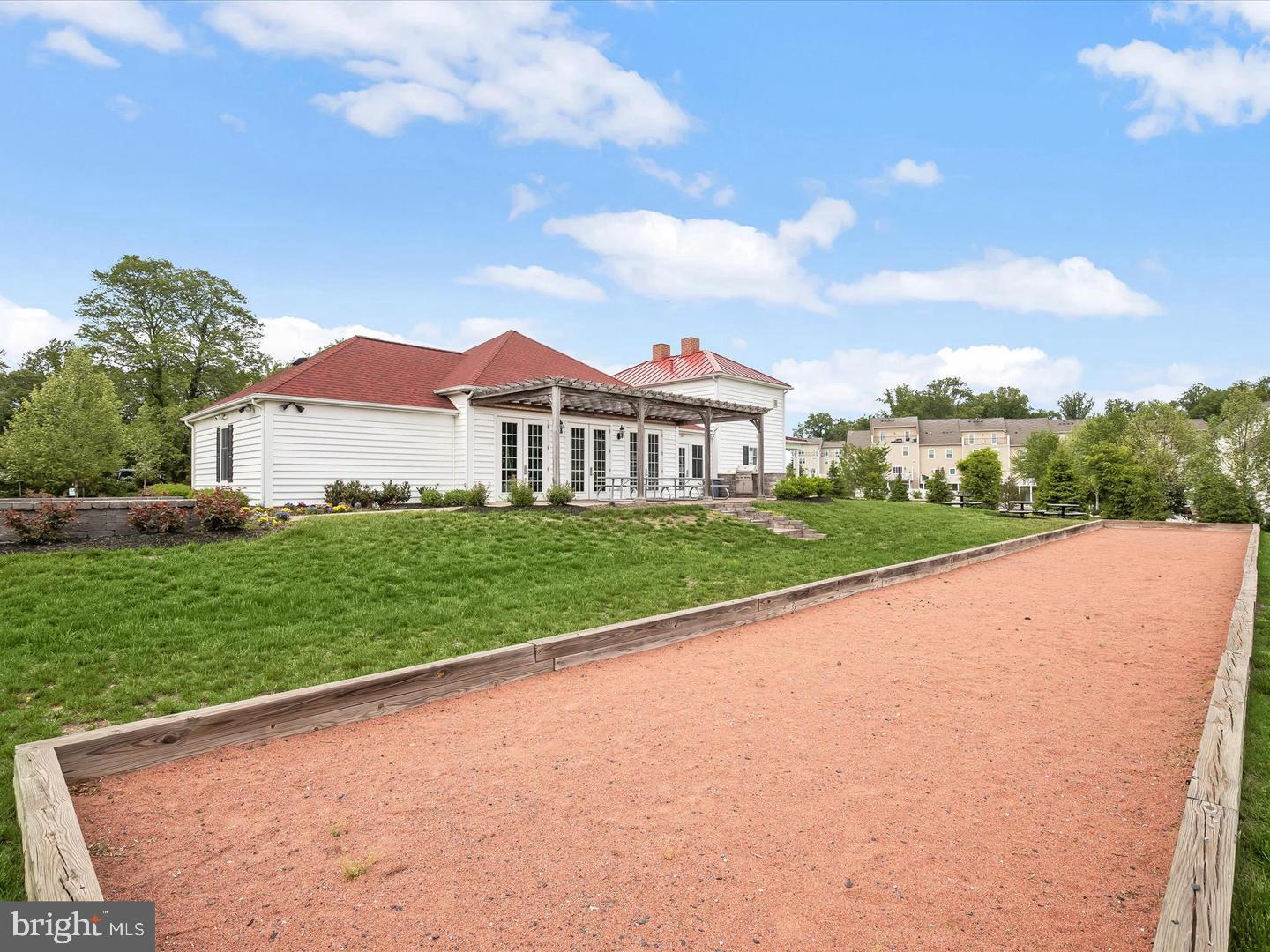 2713 Lady Slipper Road Gambrills, MD 21054 - Photo 51 of 55 a view of a house with a big yard plants and large trees