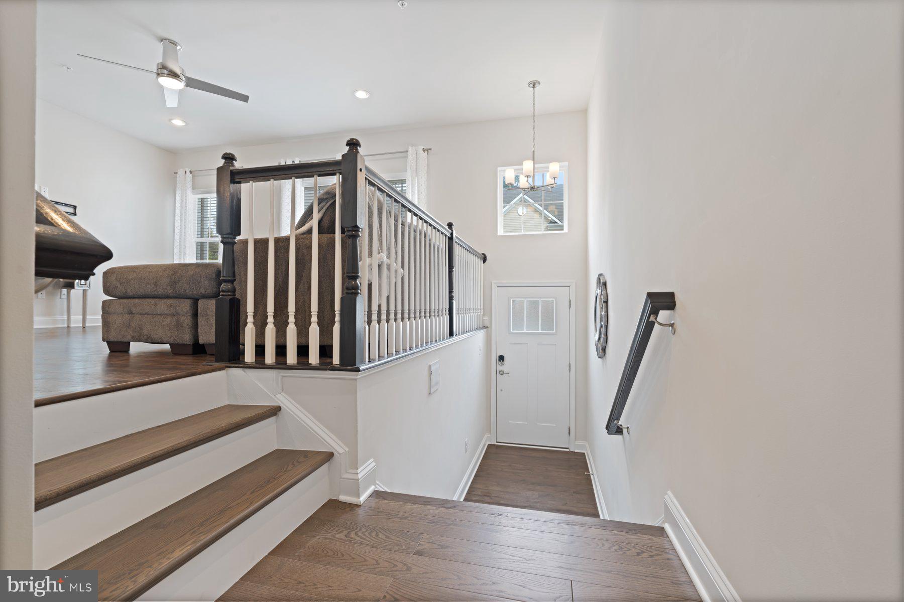 2713 Lady Slipper Road Gambrills, MD 21054 - Photo 9 of 55 a view of entryway and hall with wooden floor