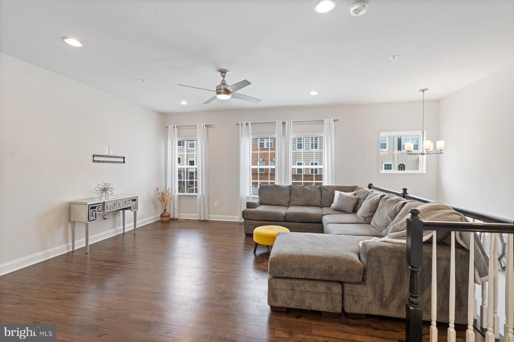 2713 Lady Slipper Road Gambrills, MD 21054 - Photo 10 of 55 a living room with furniture and wooden floor