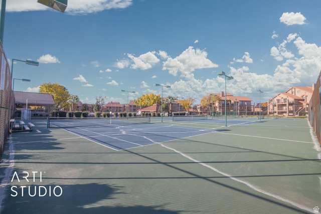 860 South Village Road, Unit A6 St. George, UT 84770 - Photo 25 of 41 View of tennis court featuring a residential view
