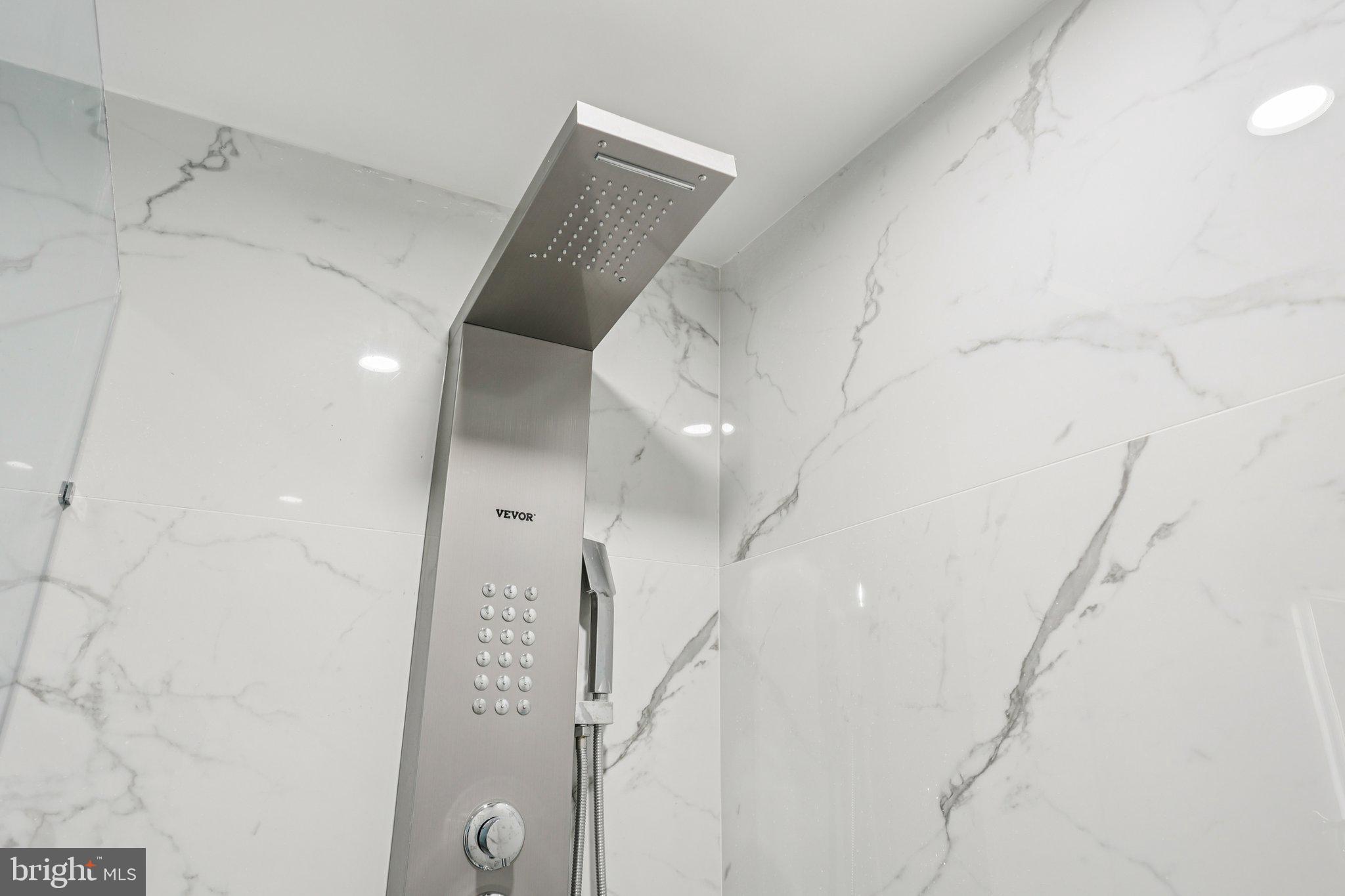 1201 Vine Street, Unit 2 Philadelphia, PA 19107 - Photo 10 of 31 a view of a hallway with windows