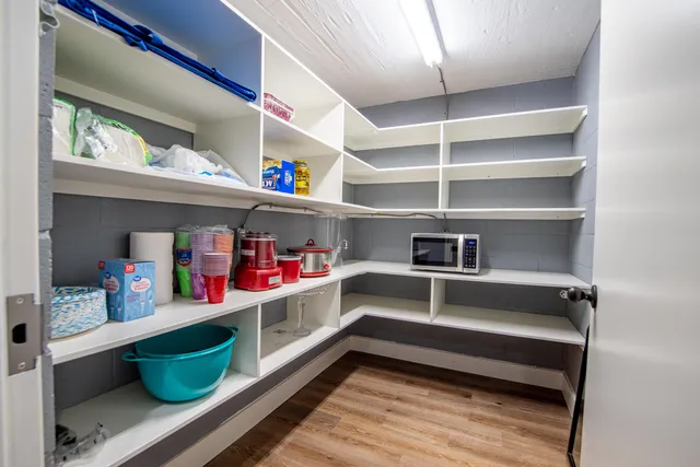 a storage room with washer and dryer