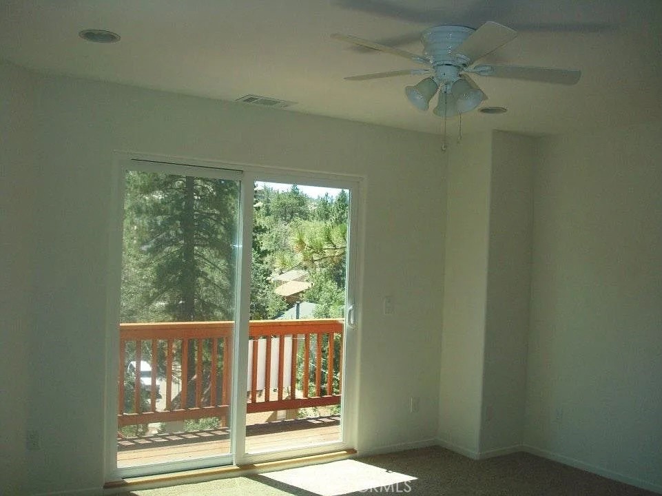 33363 Bear Road Running Springs, CA 92382 - Photo 7 of 16 Primary suite w/ full bathroom and private deck.