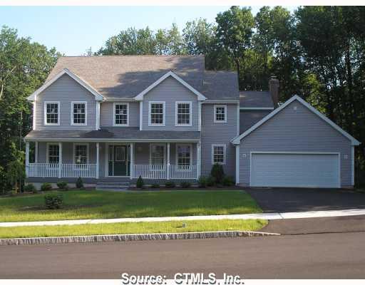55 Round Hill Road Manchester, CT 06040 - Photo 1 of 1 a front view of a house with a yard