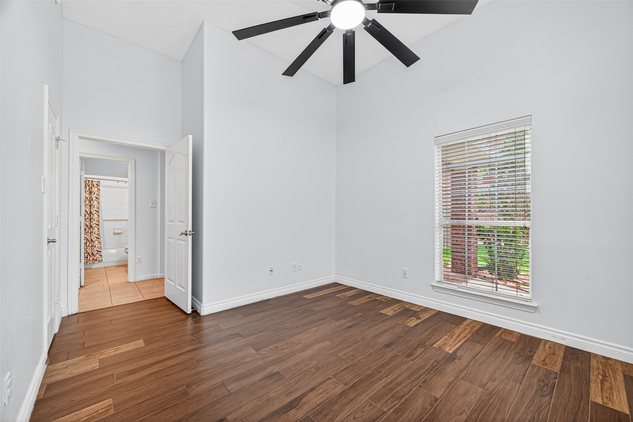 23914 Glengate Drive Spring, TX 77373 - Photo 37 of 49 wooden floor in an empty room with a window