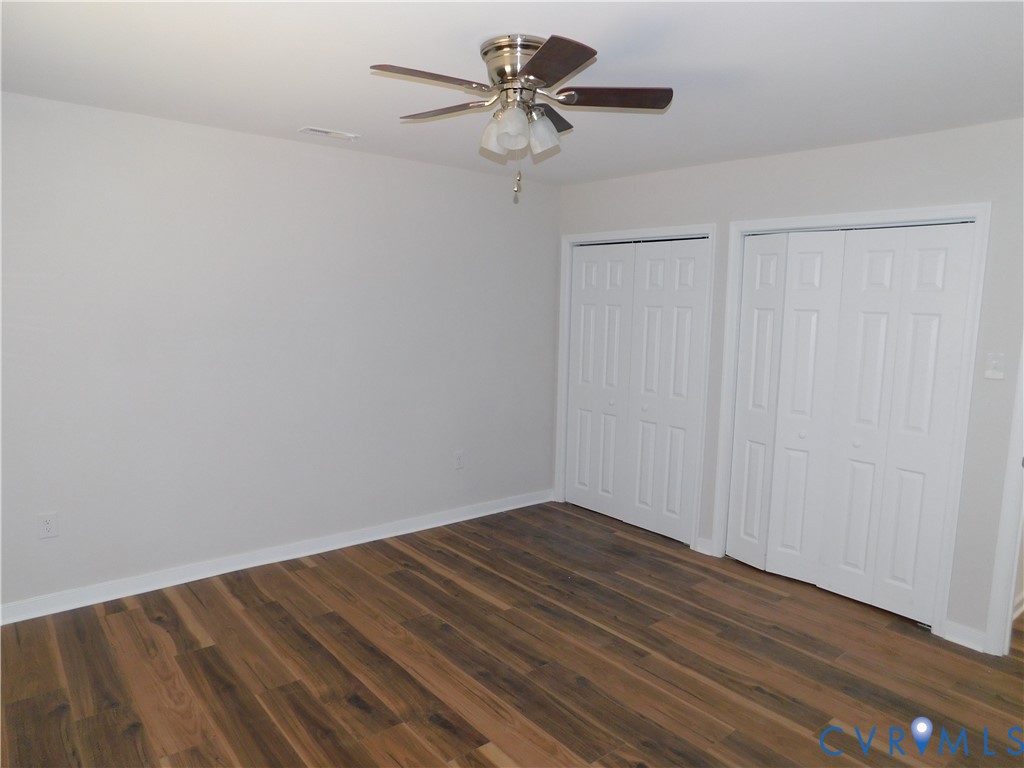 5322 Adams Road Quinton, VA 23141 - Photo 13 of 21 LVP flooring throughout, ceiling fan