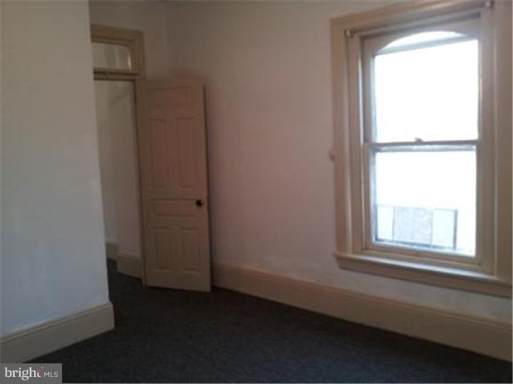 421 East High Street, Unit 3 Pottstown, PA 19464 - Photo 20 of 20 an empty room with a window