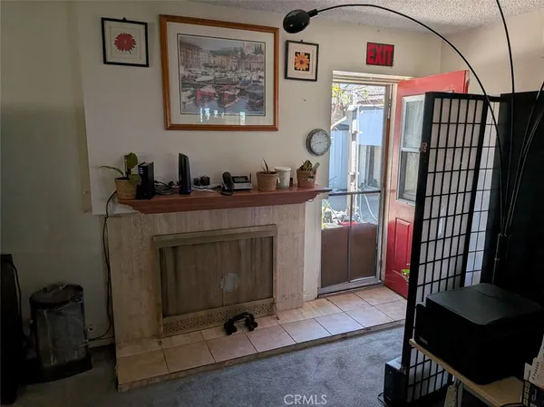 a livingroom with furniture and natural light