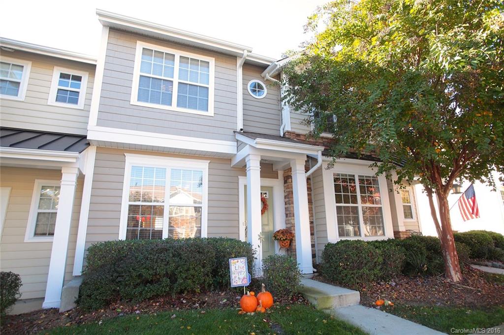 831 Gentlewinds Court, Unit 122 Fort Mill, SC 29708 - Photo 1 of 19 front view of a house with an outdoor space