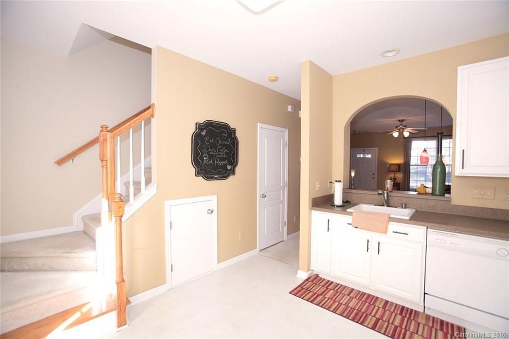 831 Gentlewinds Court, Unit 122 Fort Mill, SC 29708 - Photo 13 of 19 a view of living room with furniture and a mirror