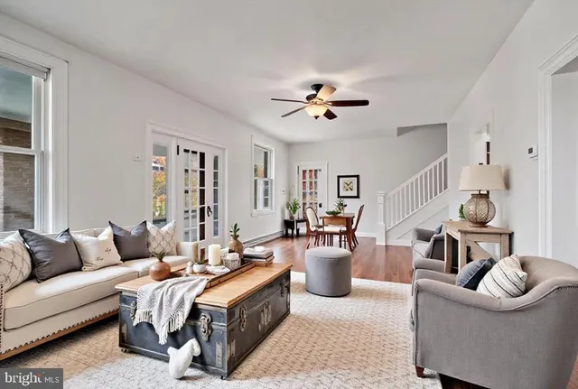 a view of an entryway with wooden floor