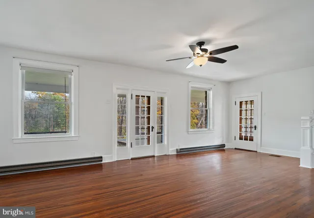 a view of entryway with wooden floor