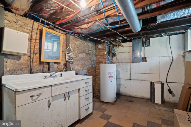 a view of a room with wooden walls