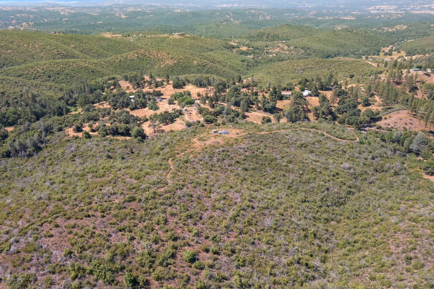 6165 Blue Eagle Mine Road Mountain Ranch, CA 95246 - Photo 2 of 13 a view of a city with ocean view