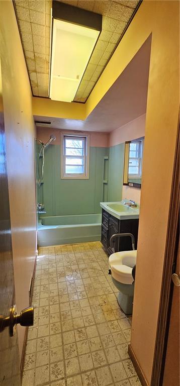404 Ridgelawn Avenue New Castle, PA 16105 - Photo 15 of 34 a bathroom with a sink a toilet and a window