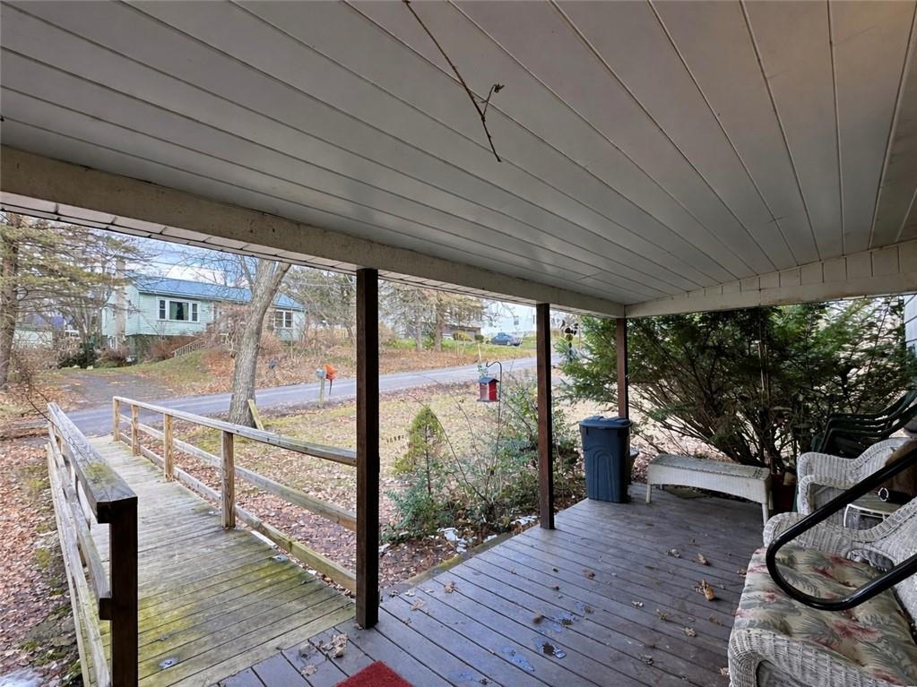 404 Ridgelawn Avenue New Castle, PA 16105 - Photo 3 of 34 a view of a porch with furniture and garden
