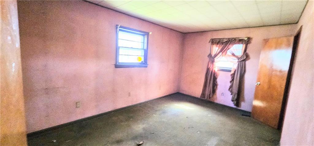 404 Ridgelawn Avenue New Castle, PA 16105 - Photo 8 of 34 an empty room with windows