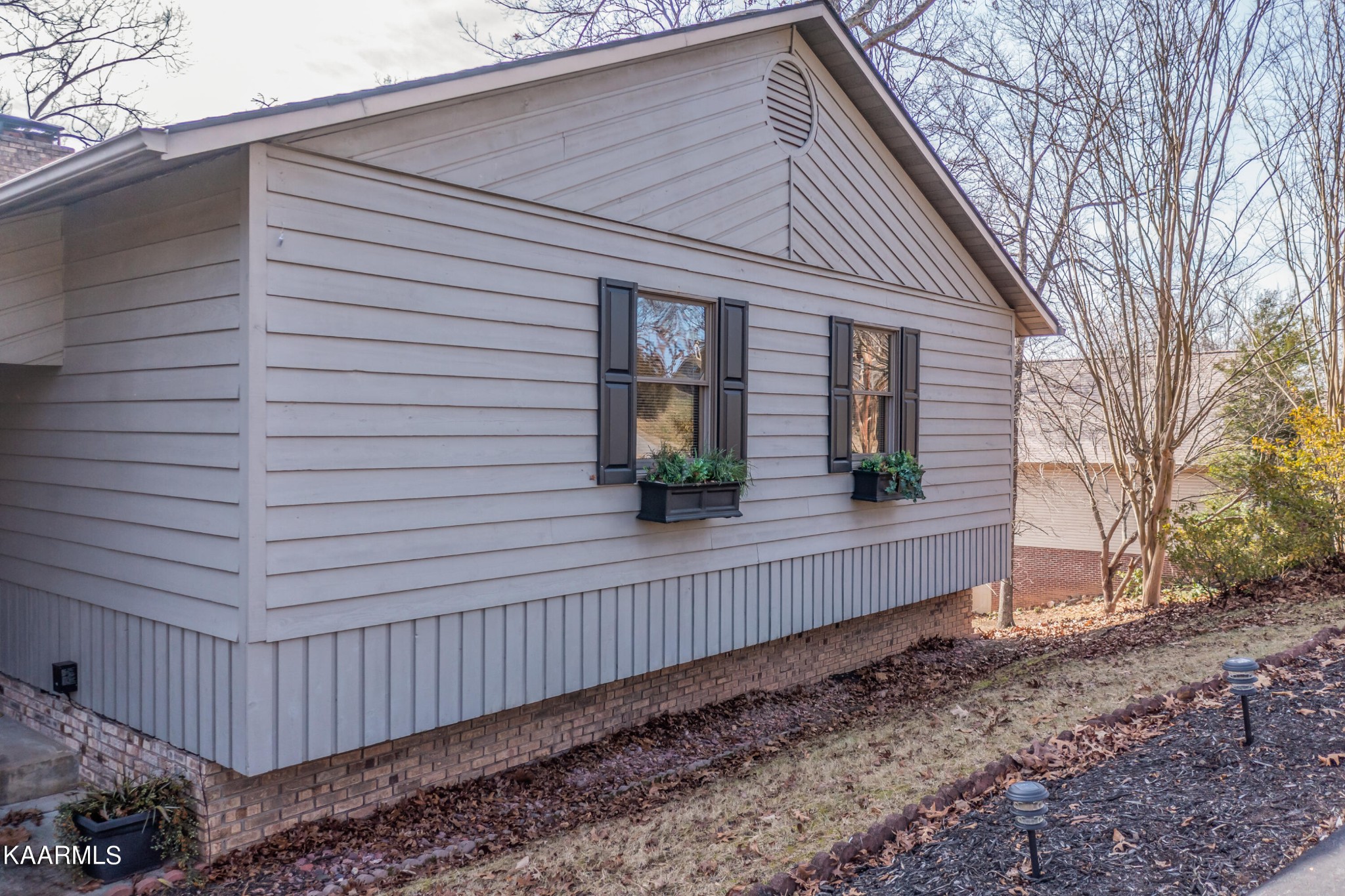 1145 Country Club Road Dandridge, TN 37725 - Photo 3 of 37 a view of a house with a yard