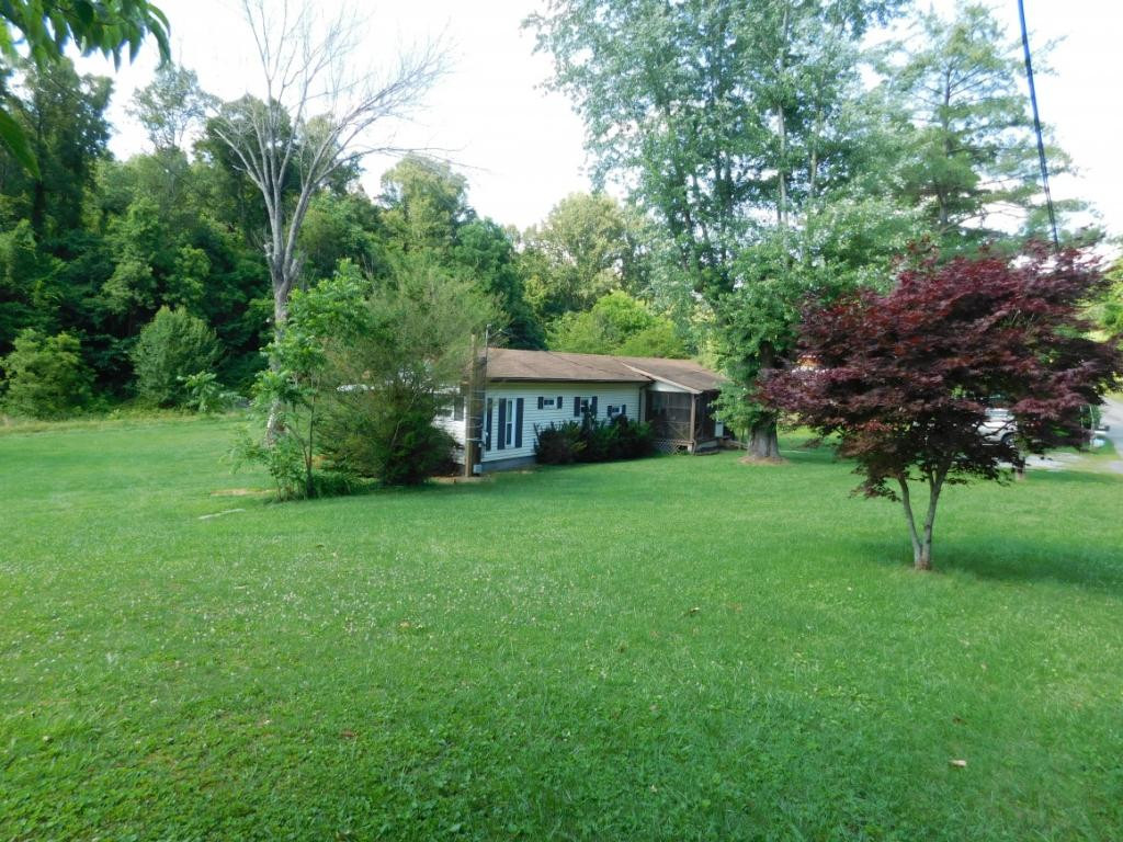 476 Deck Valley Road Bristol, TN 37620 - Photo 3 of 21 End of home many trees
