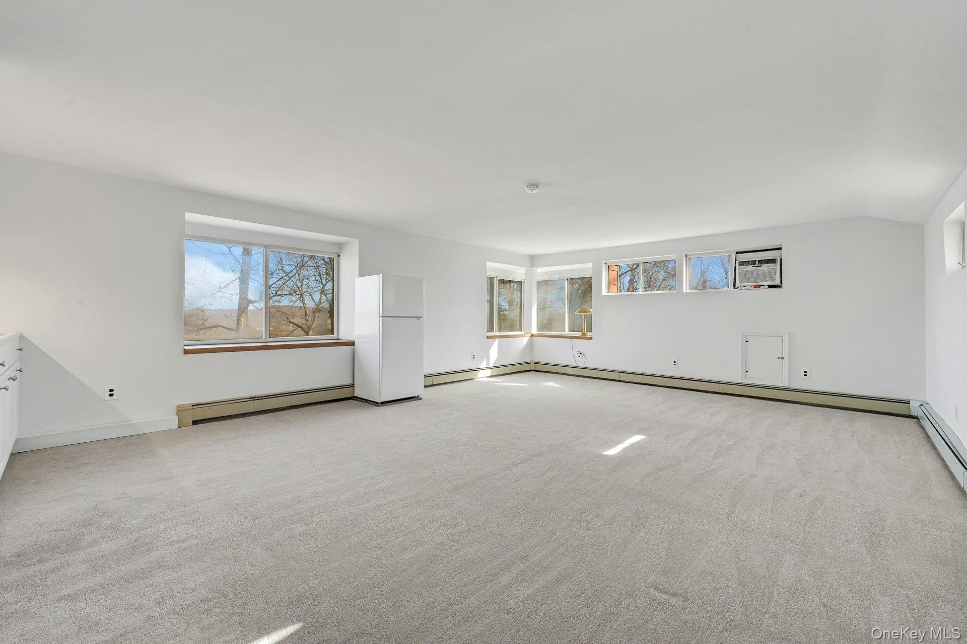 16 Young Road Katonah, NY 10536 - Photo 19 of 26 Wake up to the beauty of your surroundings in the Primary Bedroom suite.