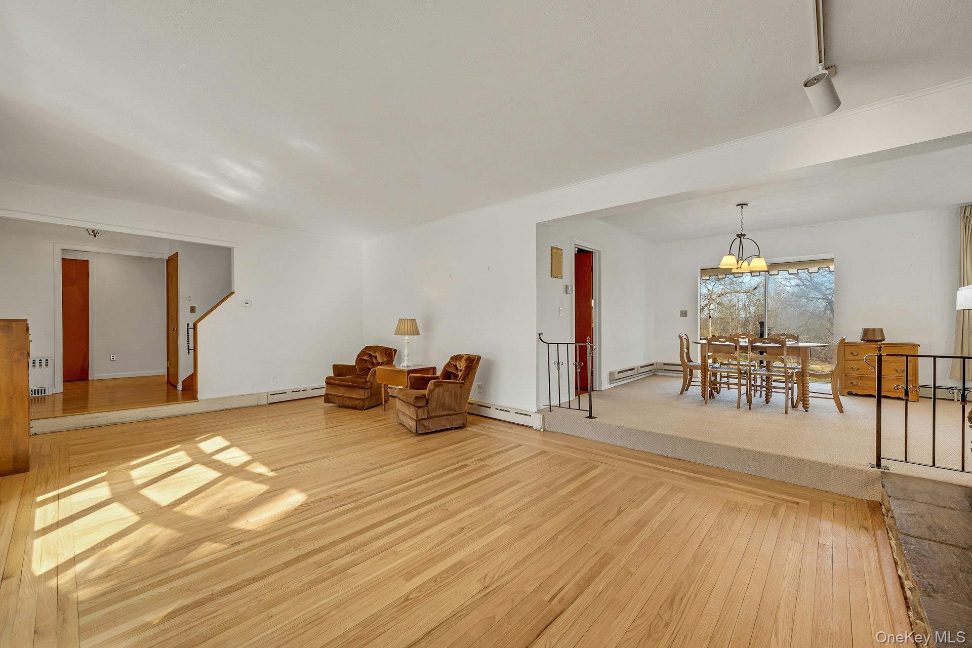 16 Young Road Katonah, NY 10536 - Photo 5 of 26 Living Room opens to Dining Room for an easy flow.