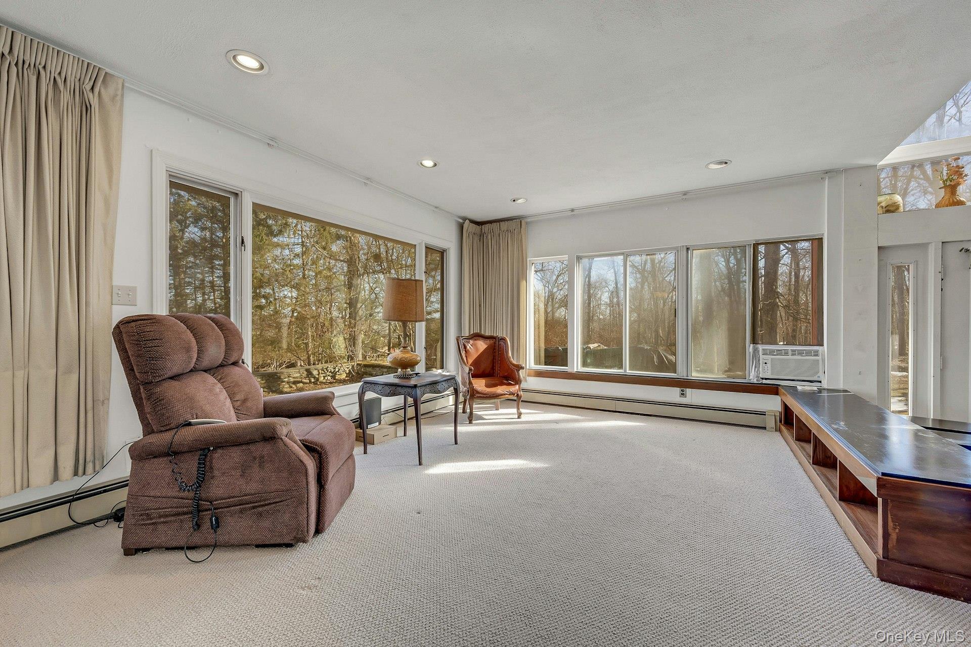 16 Young Road Katonah, NY 10536 - Photo 9 of 26 Comfortable Family Room with views, views, views.