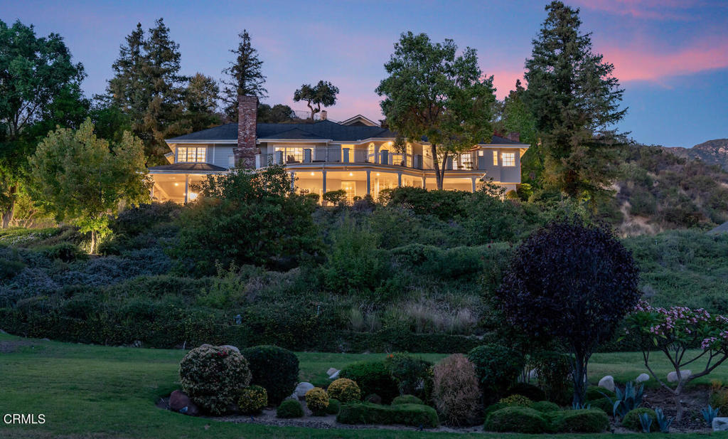 427 Long Canyon Road Bradbury, CA 91008 - Photo 1 of 62 a front view of a house with a garden