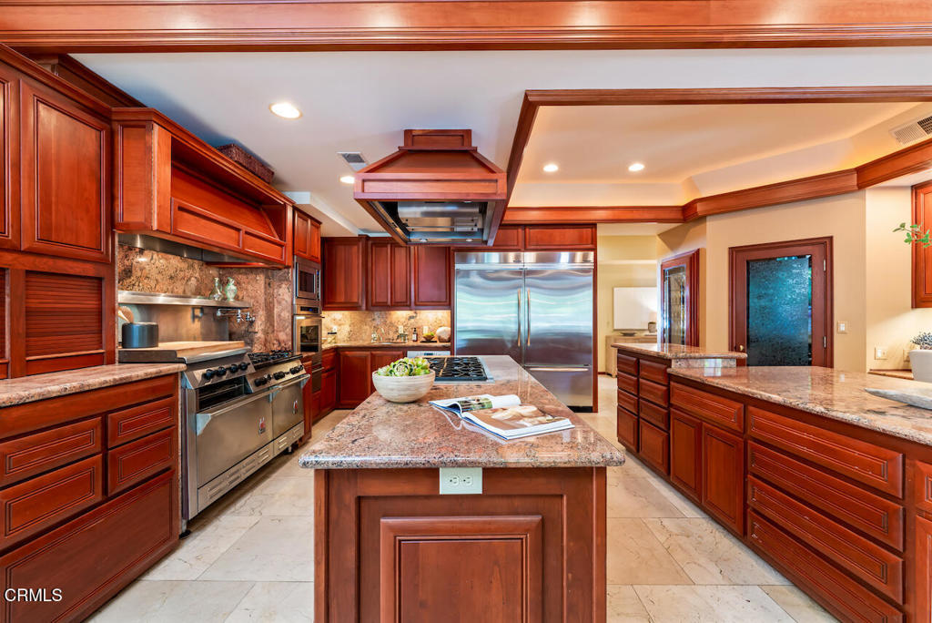 427 Long Canyon Road Bradbury, CA 91008 - Photo 14 of 62 a kitchen with granite countertop lots of counter top space