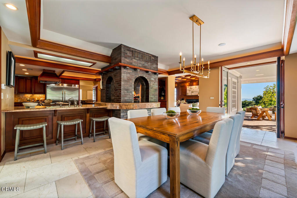 427 Long Canyon Road Bradbury, CA 91008 - Photo 18 of 62 a view of a dining room with furniture