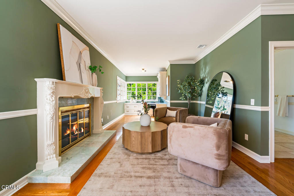 427 Long Canyon Road Bradbury, CA 91008 - Photo 22 of 62 a living room with fireplace furniture and a fireplace